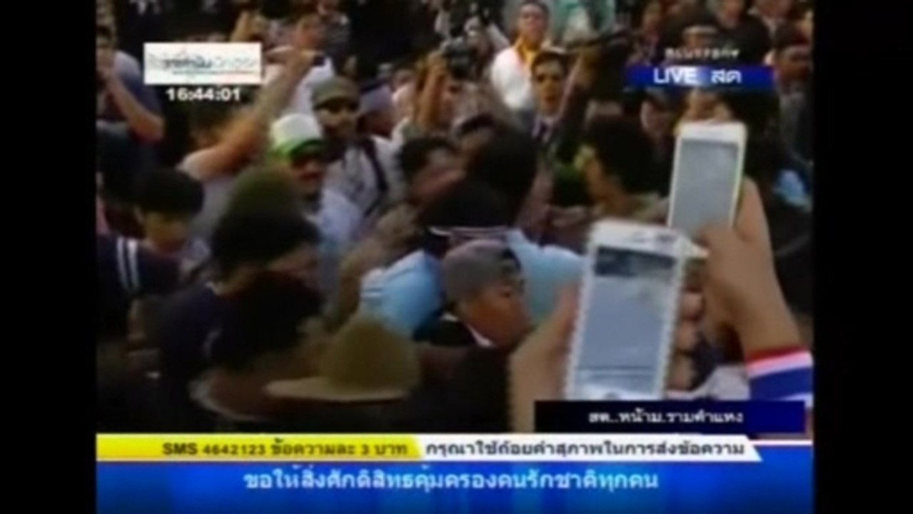 Red shirts and anti-government  protesters scuffle in Thailand