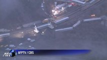 Cranes start moving derailed Bronx commuter train cars