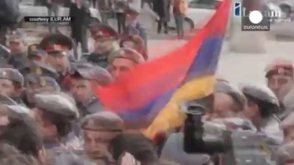 Arrests as anti-Putin protesters march in Armenia