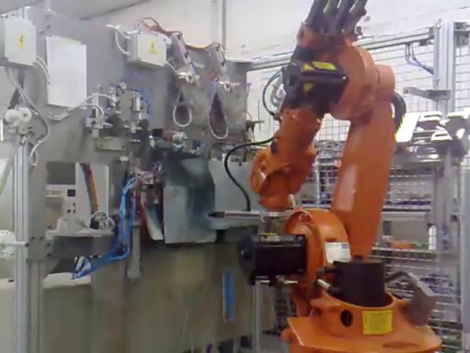 robot usati - impianto produzione cordine saldate servito da robot KUKA usato revisionato