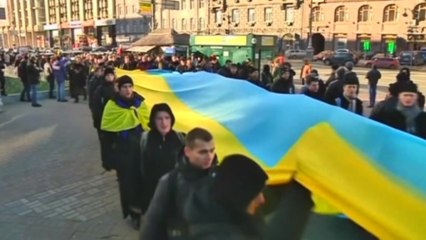 Ukraine leader heads to China, leaving turmoil at home