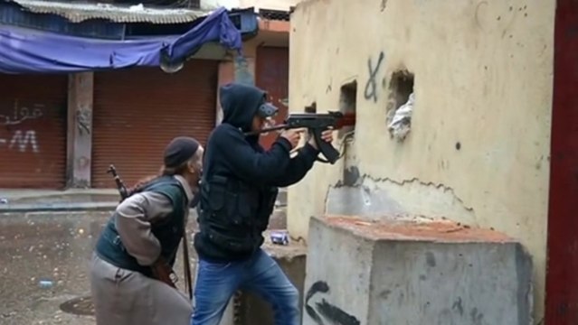 Militias battle anew in Lebanon's Tripoli, army arrests 21 fighters