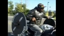 Lifting Weights While Driving Motorcycle  - Copy