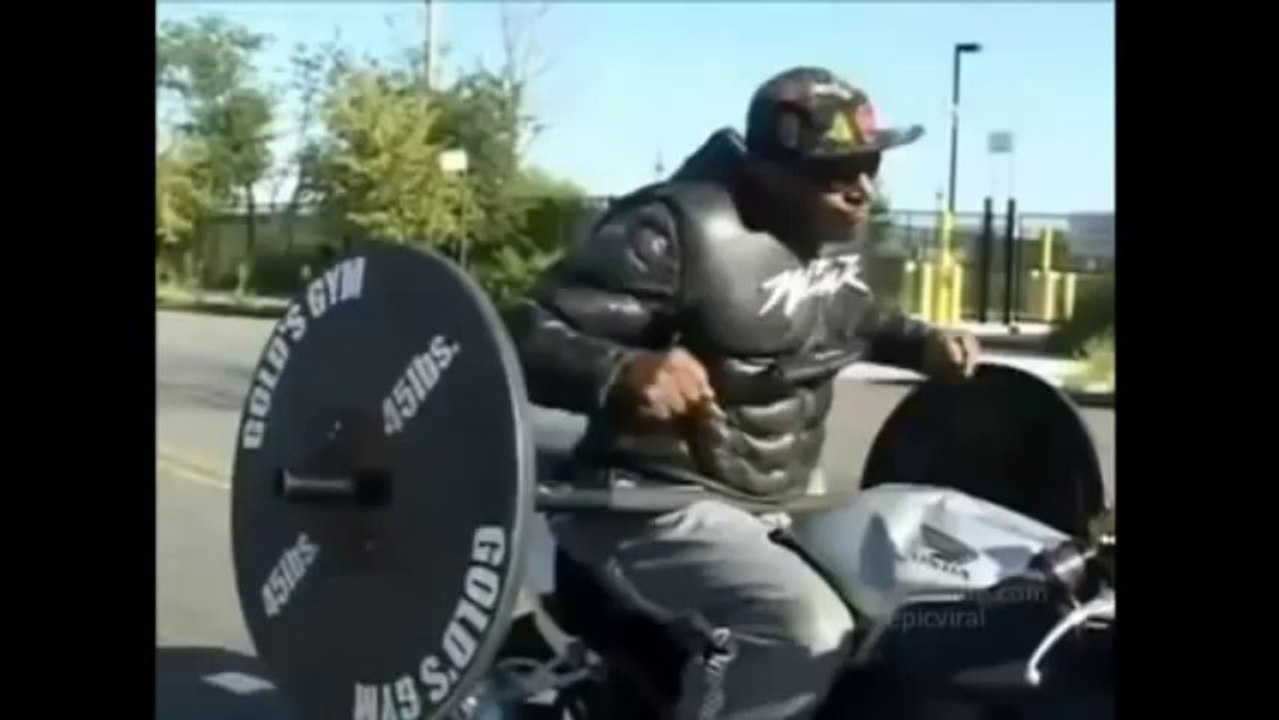 Lifting Weights While Driving Motorcycle