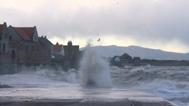 Hurricane-force winds batter UK, threaten Europe
