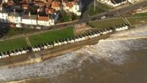 Aerial footage shows damage caused by tidal surge