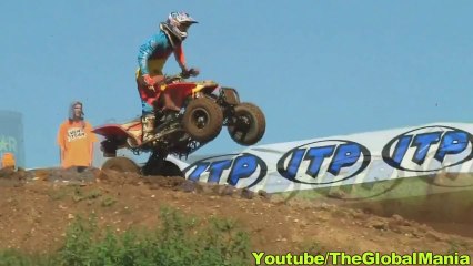 Huge Quad Jump Crash: Wheel Flys Off!