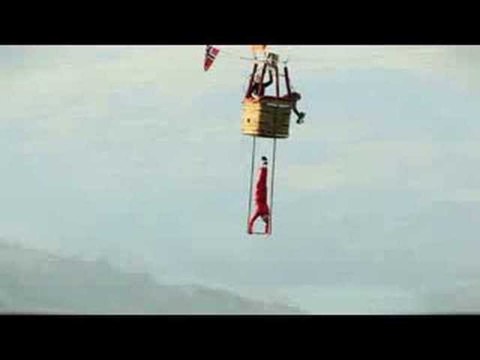 Norwegian Daredevil Performs on Trapeze Suspended by Hot Air Balloon