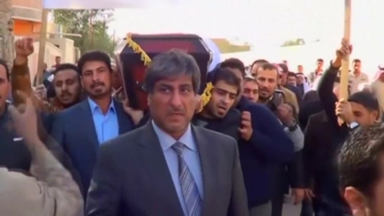 Mourners bury news cameraman slain by Syrian insurgents