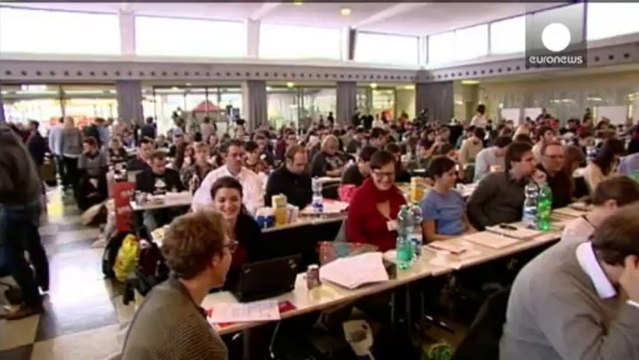 Merkel's CDU vote to back coalition deal with SPD despite misgivings