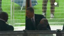 Obama shakes hand of Cuba's Raul Castro at Mandela memorial