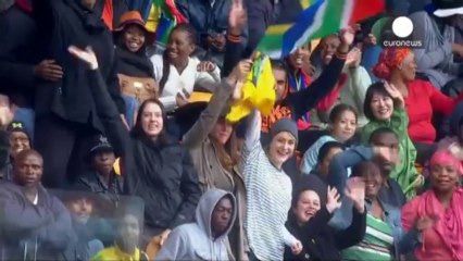 The life of Nelson Mandela celebrated at rain-soaked memorial
