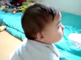 Kuran Dinleyen Çocuk