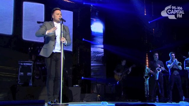 Olly Murs Capital Jingel Bell Ball Hand on heart