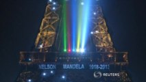 Eiffel Tower lights up for Mandela