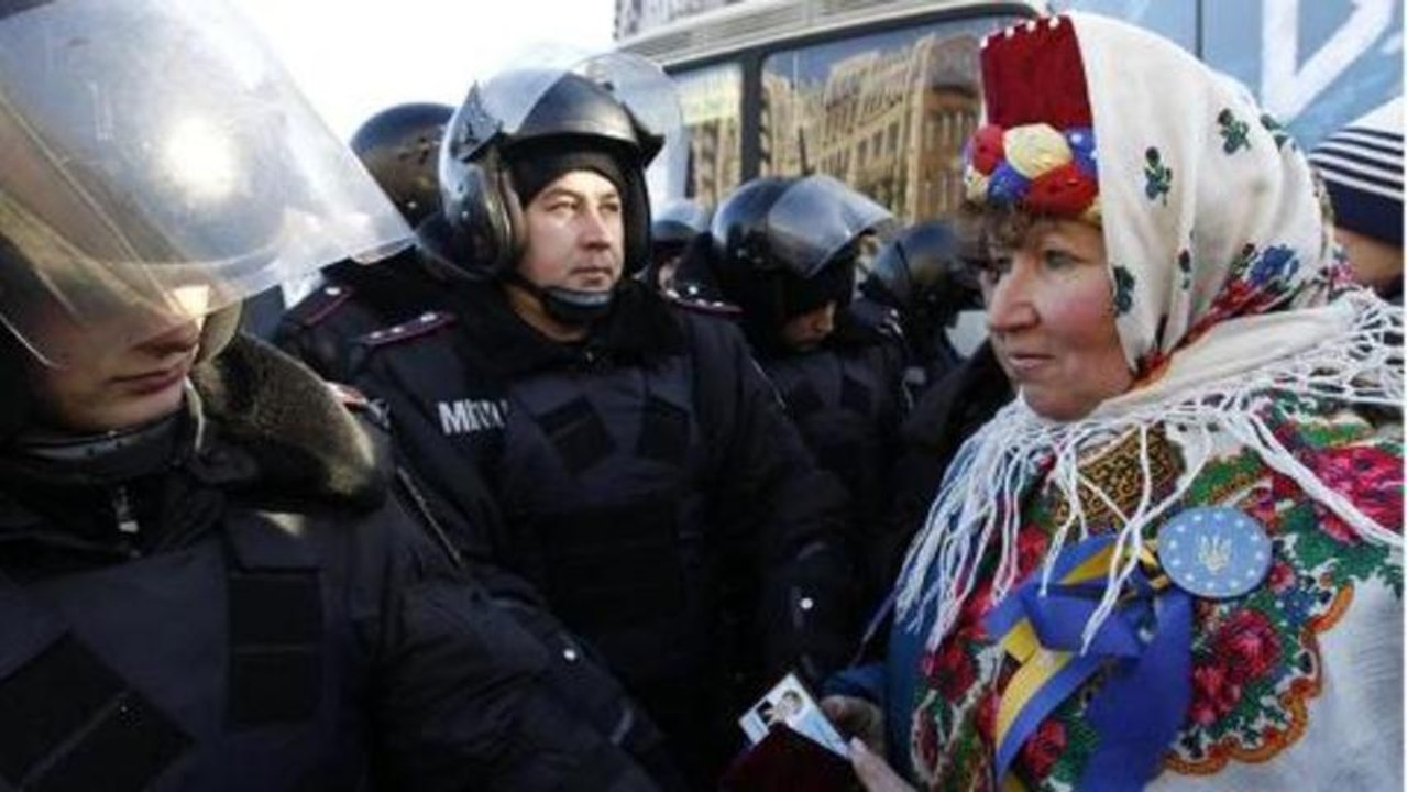 Ukraine suspends officials over crackdown