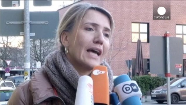 Merkel celebrates coalition deal with Social Democrats