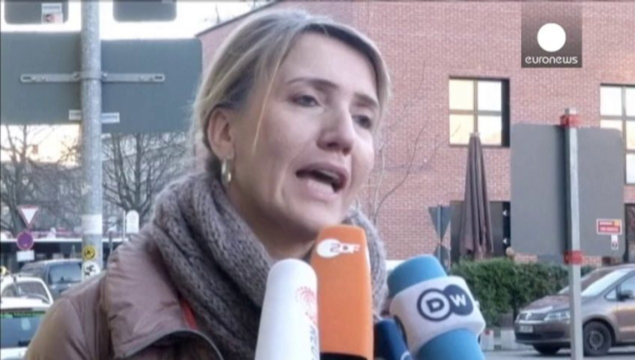 Merkel celebrates coalition deal with Social Democrats