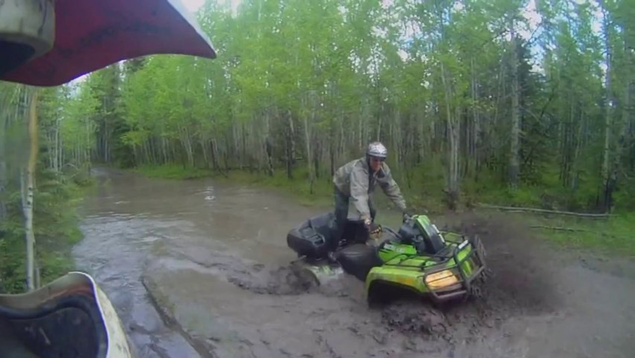ATV Deep Mudding Action!