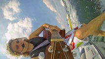 This Guy Playing Guitar While Surfing Will Warm You Up