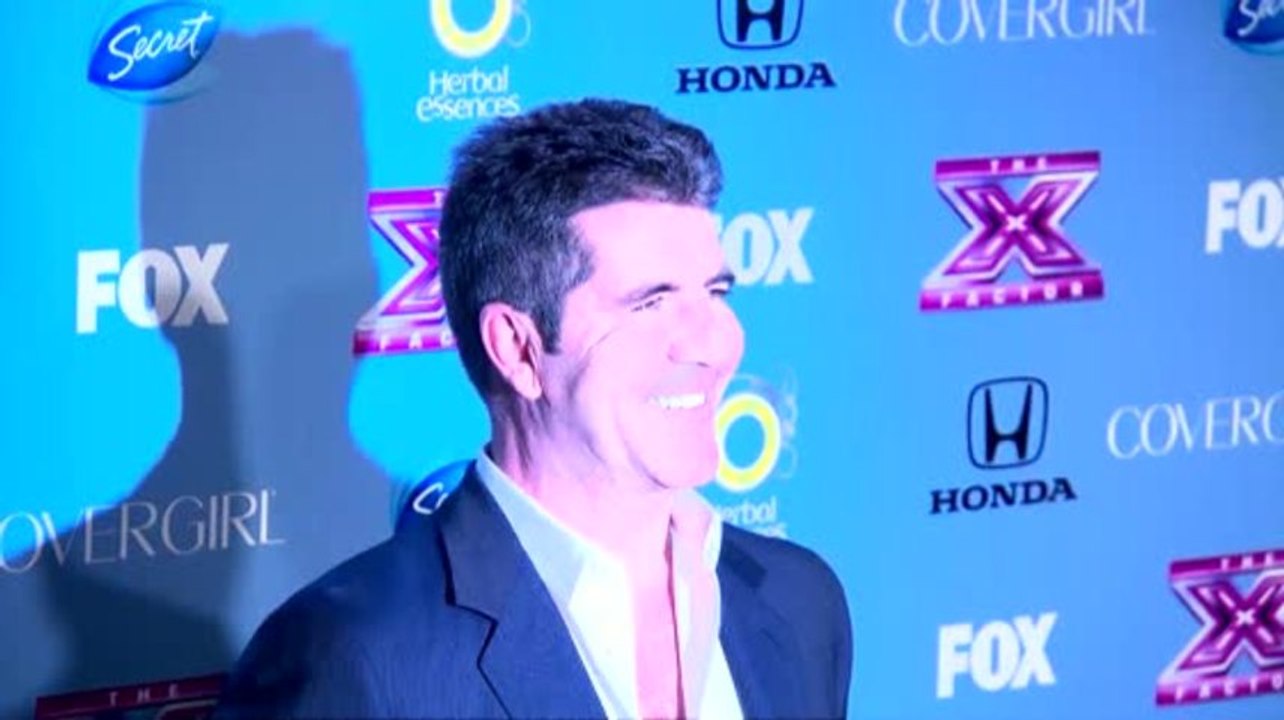 Simon Cowell Won't Spend Christmas With Lauren Silverman