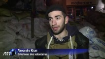 Derrière les barricades de Kiev, des militants montent la garde