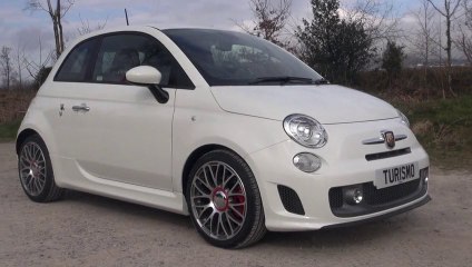 The 2013 Abarth 595 Turismo in Gara White with Red Leather