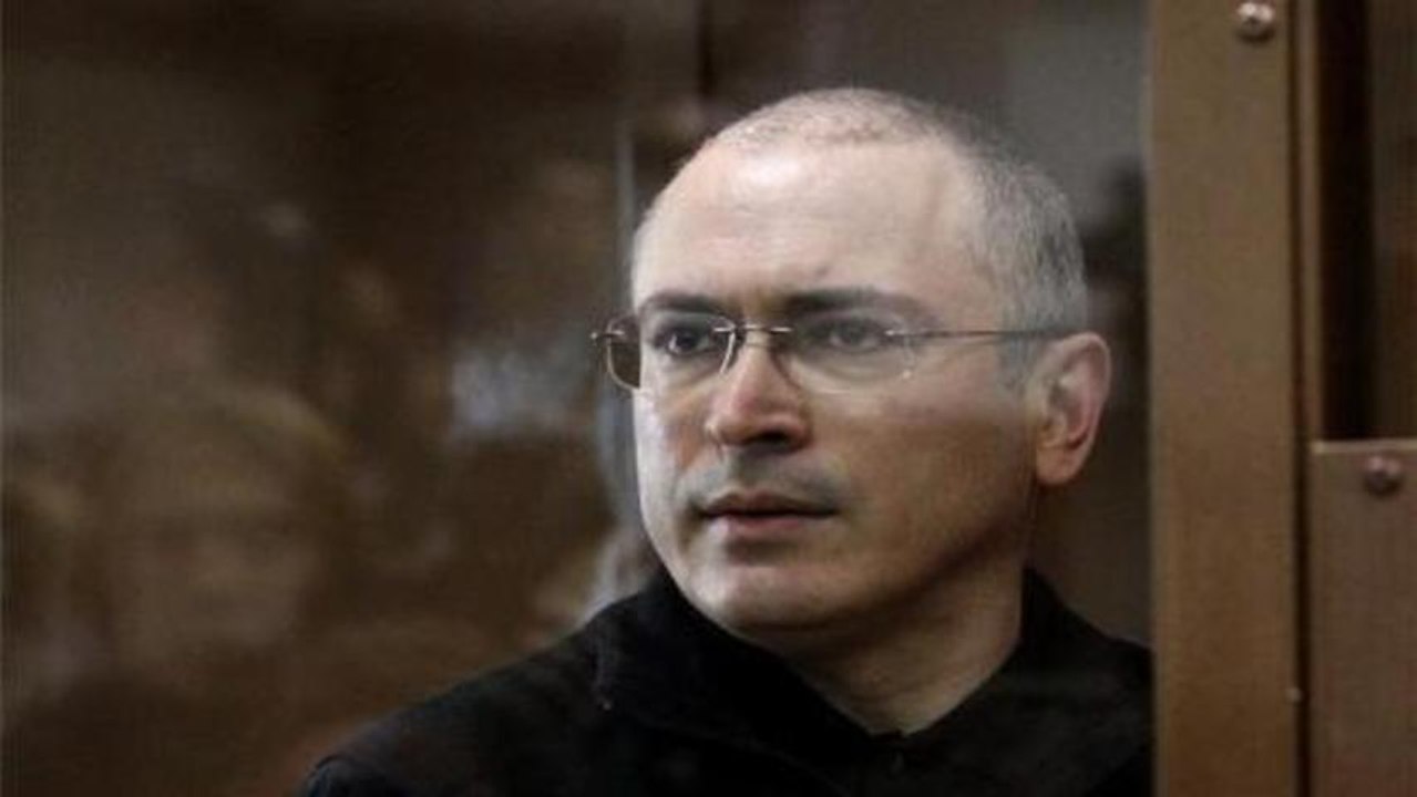 Pardoned Kremlin critic reunited with family