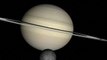 CU grey moon lower middle orbits Saturn