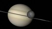 CU Saturn grey moon orbits planet fast