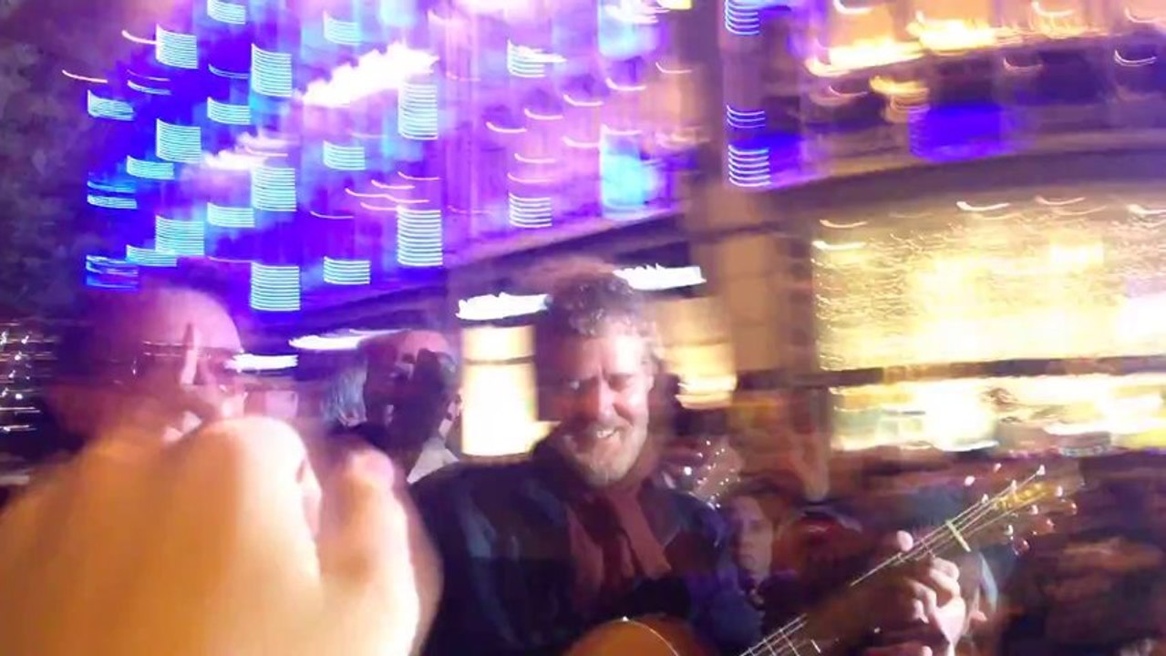 U2's Bono Busks for Charity