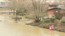 Storms batter Britain, bringing flooding and power cuts