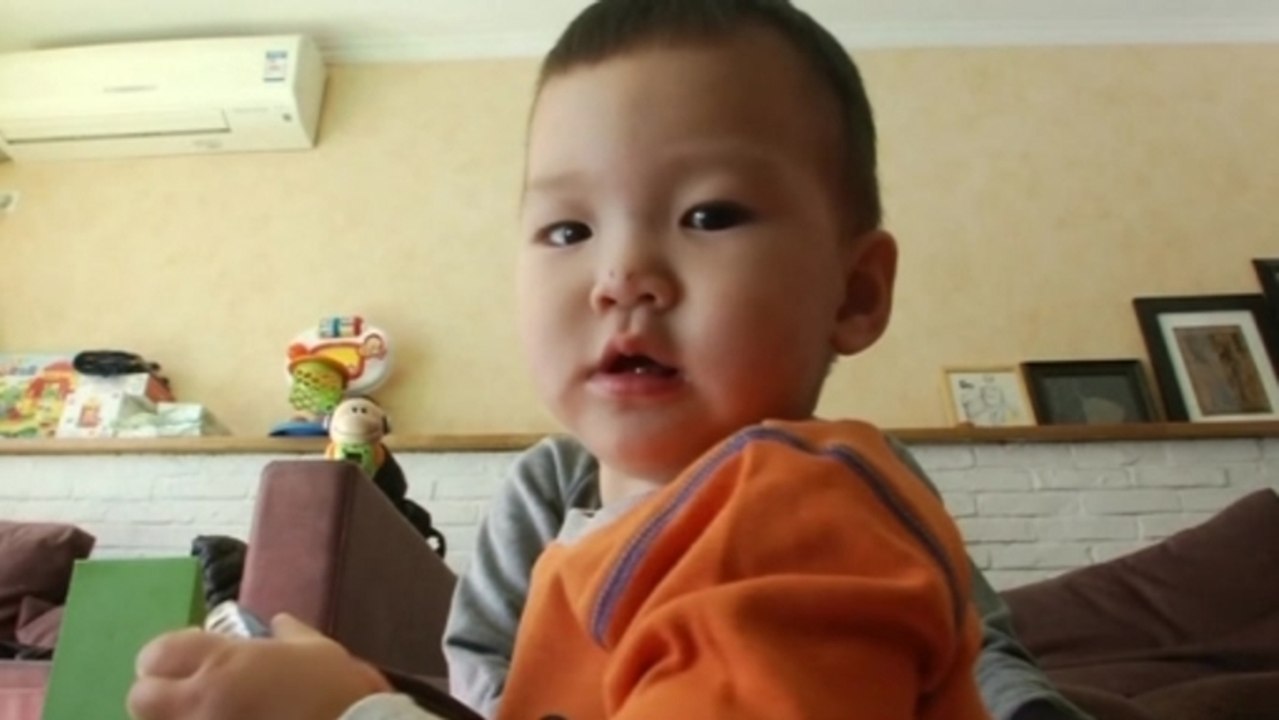 China formally eases one-child policy
