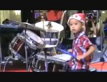 Small Kid playing drums