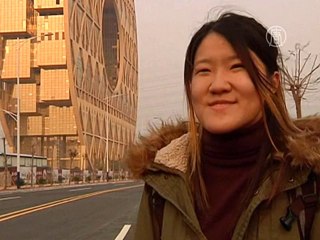 В Китае достроили спорное здание-монету