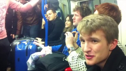 Group Spread Christmas Joy on the London Subway