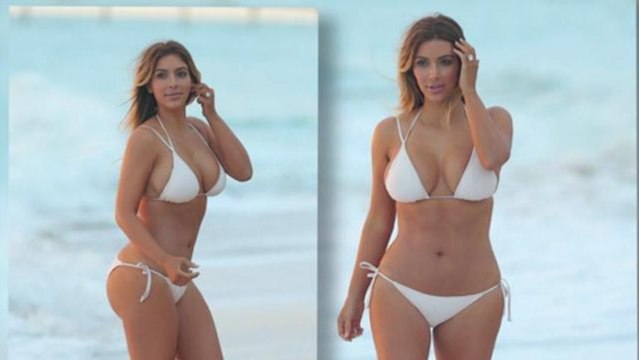 Kim Kardashian Hits The Beach in Bikini