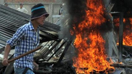 Cambodia police fire at garment workers