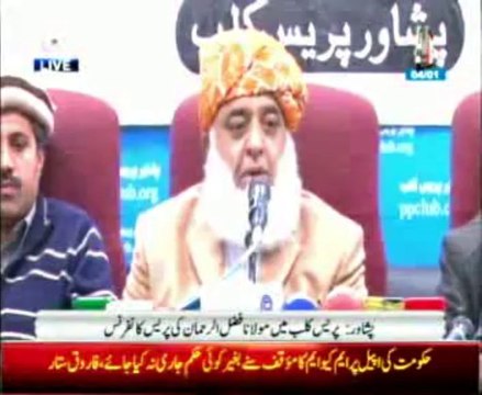 Maulana Fazal-ur-Rehman addressing a press conference