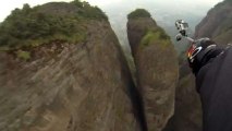 Jeb Corliss Flies Through 10ft Gab In Cliff
