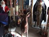 Animatronic life size deer animal statue.