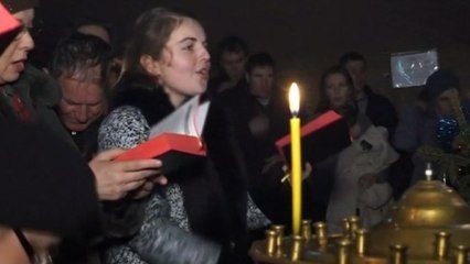 Ukrainian protesters celebrate orthodox Christmas