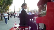Memory on foot of the London Eye played by Frederic La Verde and his traveling Piano Rouge
