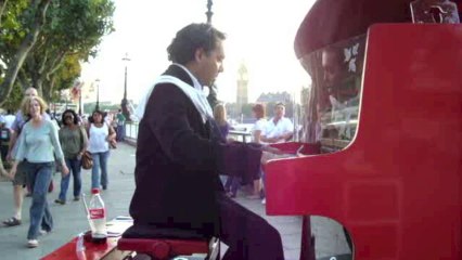 Titanic on foot of the London Eye played by Frederic La Verde and his Traveling Piano Rouge
