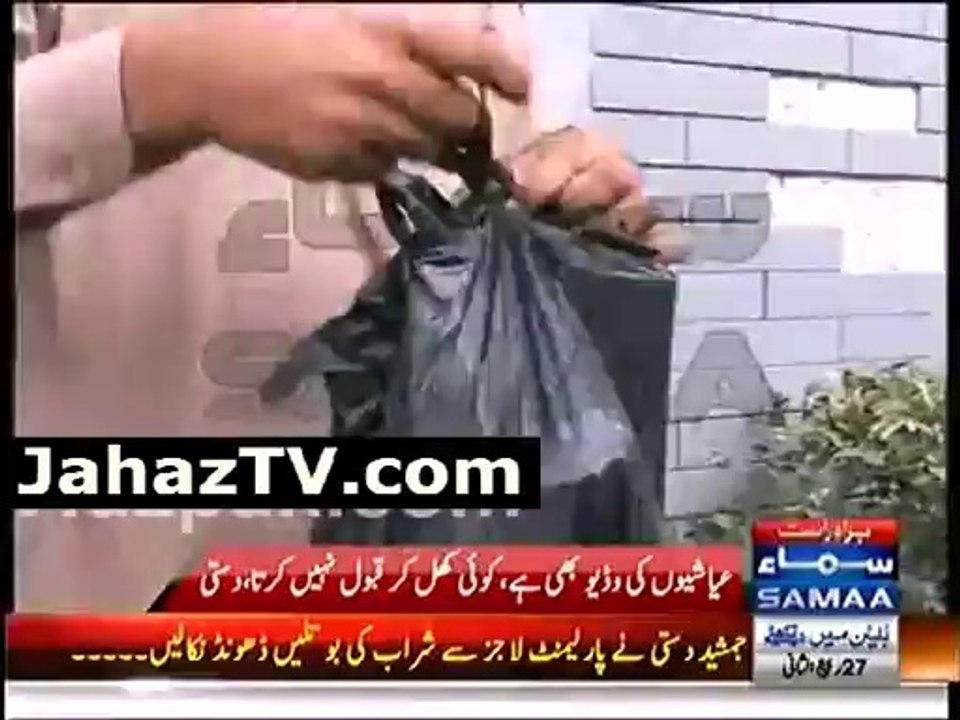 Jamshed Dasti shows empty Wine Bottles to Media - Video Dailymotion