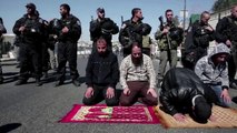 Friday prayers in street after Israel restricts access to mosque