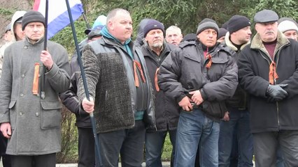 Pro-Russians rally outside official buildings in Crimea