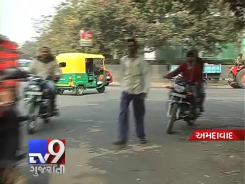 Floating kite string slits biker's throat, Ahmedabad - Tv9 Gujarati