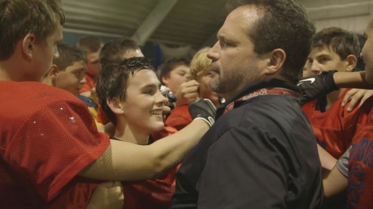 Passing Down the Love of Football Through Coaching