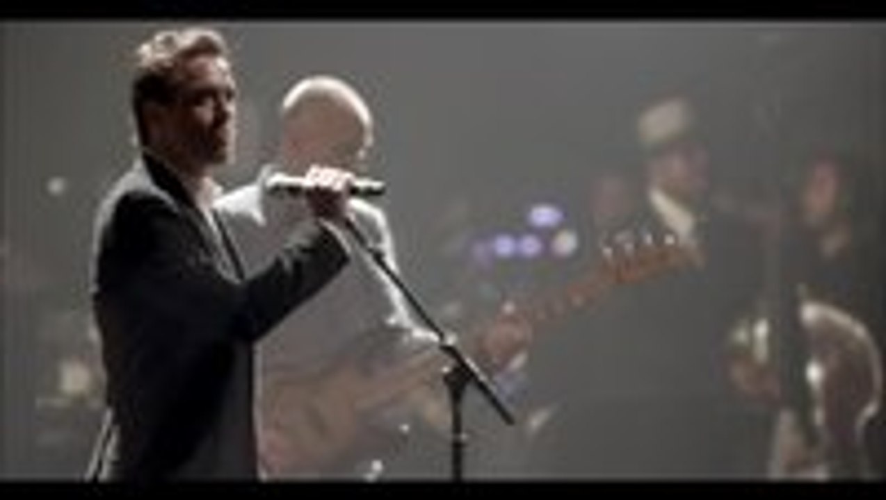 Robert Downey Jr sings with Sting and absolutely kills it.